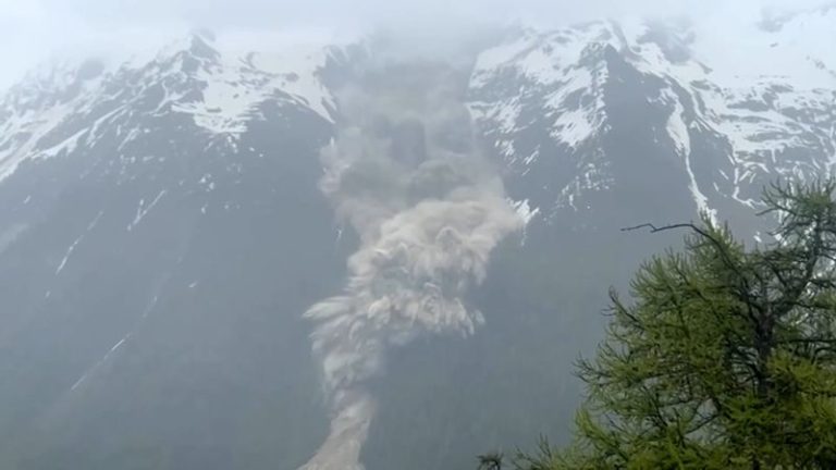 Mud and rock buries evacuated Swiss village after glacier collapse, one person missing